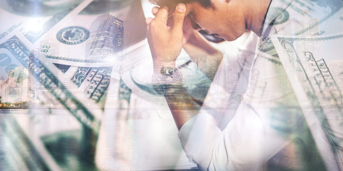 Serious businessman working with analysis financial at office.