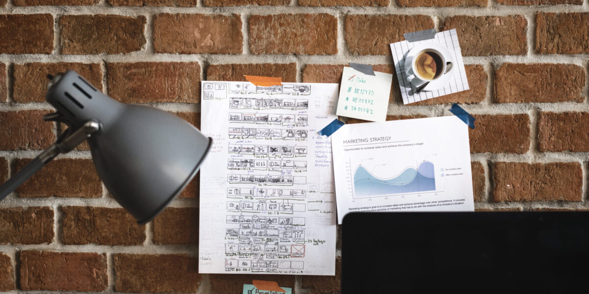 workspace-with-note-brick-wall